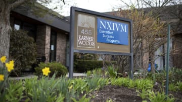 ALBANY, NY - APRIL 26: The NXIVM Executive Success Programs sign outside of the office at 455 New Karner Road on April 26, 2018 in Albany, New York. Keith Raniere, founder of NXIVM, was arrested by the FBI in Mexico in March of 2018. (Photo by Amy Luke/Getty Images)