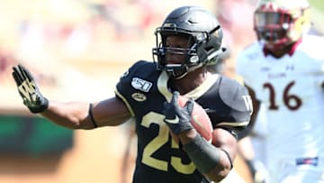 Sep 21, 2019; Winston-Salem, NC, USA; Wake Forest Demon Deacons running back Kenneth Walker III (25) carries the ball during the third quarter against the Elon Phoenix at BB&T Field. Mandatory Credit: Jeremy Brevard-USA TODAY Sports