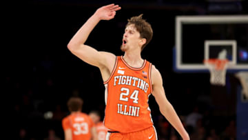 Dec 6, 2022; New York, New York, USA; Illinois Fighting Illini forward Matthew Mayer (24) celebrates his three point shot against the Texas Longhorns during the first half at Madison Square Garden. Mandatory Credit: Brad Penner-USA TODAY Sports
