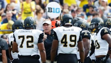 Aug 30, 2014; Ann Arbor, MI, USA; Appalachian State Mountaineers defensive coordinator Nate Woody talks to his players against the Michigan Wolverines at Michigan Stadium. Mandatory Credit: Rick Osentoski-USA TODAY Sports