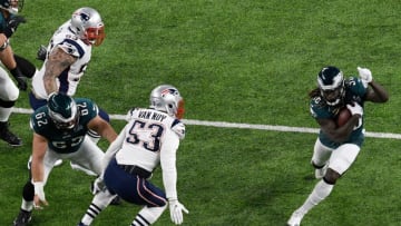 MINNEAPOLIS, MN - FEBRUARY 04: Jay Ajayi #36 of the Philadelphia Eagles runs the ball against Kyle Van Noy #53 of the New England Patriots during the first quarter in Super Bowl LII at U.S. Bank Stadium on February 4, 2018 in Minneapolis, Minnesota. (Photo by Hannah Foslien/Getty Images)