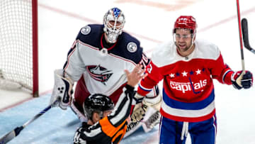 WASHINGTON, DC - DECEMBER 09: Referee Brad Meier (34) issues a two minute penalty to Washington Capitals Right Wing Tom Wilson (43) during a NHL game between the Washington Capitals and the Columbus Blue Jackets on December 09, 2019, at Capital One Arena, in Washington D.C.(Photo by Tony Quinn/Icon Sportswire via Getty Images)