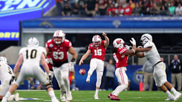 ARLINGTON, TX - JANUARY 02: Anthony Lotti #15 of the Wisconsin Badgers punts in the fourth quarter during the 81st Goodyear Cotton Bowl Classic between Western Michigan and Wisconsin at AT&T Stadium on January 2, 2017 in Arlington, Texas. (Photo by Tom Pennington/Getty Images)