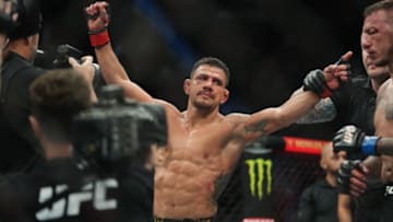 Mar 5, 2022; Las Vegas, Nevada, UNITED STATES; Rafael Dos Anjos celebrates after defeating Renato Moicano (not pictured) during UFC 272 at T-Mobile Arena. Mandatory Credit: Stephen R. Sylvanie-USA TODAY Sports