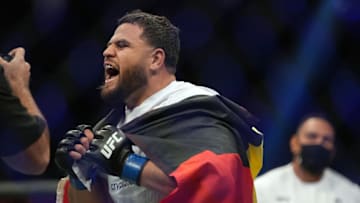 Dec 11, 2021; Las Vegas, Nevada, USA; Tai Tuivasa is declared the winner by knockout against Agusto Sakai during UFC 269 at T-Mobile Arena. Mandatory Credit: Stephen R. Sylvanie-USA TODAY Sports