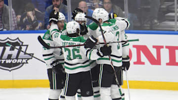 ST. LOUIS, MO - APRIL 25: Stars players celebrate after scoring in the first period during a second round Stanley Cup Playoffs game between the Dallas Stars and the St. Louis Blues, on April 25, 2019, at Enterprise Center, St. Louis, Mo. (Photo by Keith Gillett/Icon Sportswire via Getty Images)