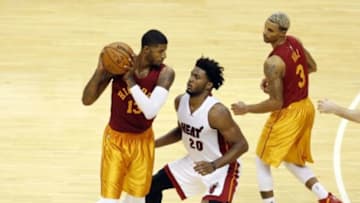 Nov 6, 2015; Indianapolis, IN, USA; Indiana Pacers forward Paul George (13) is guarded by Miami Heat forward Justise Winslow (20) at Bankers Life Fieldhouse. Indiana defeats Miami 90-87. Mandatory Credit: Brian Spurlock-USA TODAY Sports