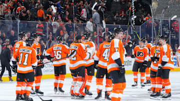 PHILADELPHIA, PA - APRIL 29: The Philadelphia Flyers salute the crowd against the Ottawa Senators at the Wells Fargo Center on April 29, 2022 in Philadelphia, Pennsylvania. (Photo by Mitchell Leff/Getty Images)