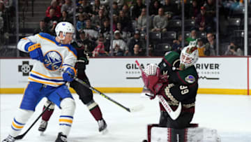 Dec 17, 2022; Tempe, Arizona, USA; Arizona Coyotes goaltender Connor Ingram (39) makes a save in front of Buffalo Sabres left wing Jeff Skinner (53) during the first period at Mullett Arena. Mandatory Credit: Joe Camporeale-USA TODAY Sports