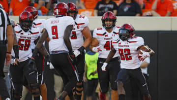 STILLWATER, OK - SEPTEMBER 22: Wide receiver KeSean Carter #82 of the Texas Tech Red Raiders celebrates a touchdown against the Oklahoma State Cowboys in the second quarter on September 22, 2018 at Boone Pickens Stadium in Stillwater, Oklahoma. (Photo by Brian Bahr/Getty Images)