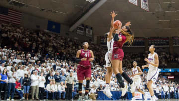 STORRS, CT - FEBRUARY 13: South Carolina's Forward A'ja Wilson (22) goes to the basket around UConn Huskies Guard Gabby Williams (15) during the second half of a women's division 1 basketball game between 6th ranked University of South Carolina and the