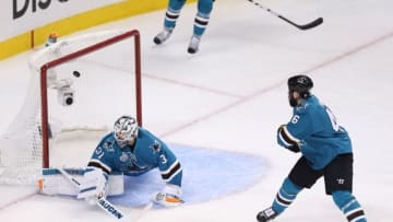 Jun 6, 2016; San Jose, CA, USA; San Jose Sharks goalie Martin Jones (31) is beat for a goal by Pittsburgh Penguins defenseman Ian Cole (not pictured) as Sharks defenseman Roman Polak (46) looks on in the first period in game four of the 2016 Stanley Cup Final at SAP Center at San Jose. Mandatory Credit: John Hefti-USA TODAY Sports