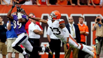 Sep 21, 2014; Cleveland, OH, USA; Baltimore Ravens wide receiver Steve Smith (89) makes a long reception against Cleveland Browns cornerback Joe Haden (23) during the fourth quarter at FirstEnergy Stadium. The Ravens won 23-21. Mandatory Credit: Ron Schwane-USA TODAY Sports