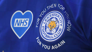 NHS logo and Leicester City badge (Photo by Michael Regan/Getty Images)