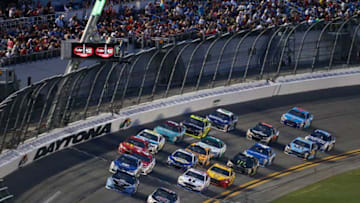 DAYTONA BEACH, FL - JULY 01: Brad Keselowski, driver of the #2 Detroit Genuine Parts Ford, and Kevin Harvick, driver of the #4 Jimmy John's Ford (Photo by Sarah Crabill/Getty Images)