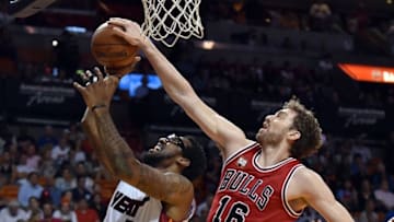 Apr 7, 2016; Miami, FL, USA; Chicago Bulls center Pau Gasol (16) blocks the shot by Miami Heat forward Amar