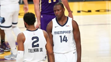 LOS ANGELES, CALIFORNIA - FEBRUARY 12: Gorgui Dieng #14 of the Memphis Grizzlies reacts in the game against the Los Angeles Lakers at Staples Center on February 12, 2021 in Los Angeles, California. NOTE TO USER: User expressly acknowledges and agrees that, by downloading and or using this photograph, User is consenting to the terms and conditions of the Getty Images License Agreement. (Photo by Meg Oliphant/Getty Images)