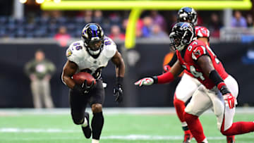 ATLANTA, GA - DECEMBER 2: Ty Montgomery #88 of the Baltimore Ravens carries the ball against the Atlanta Falcons at Mercedes-Benz Stadium on December 2, 2018 in Atlanta, Georgia. (Photo by Scott Cunningham/Getty Images)