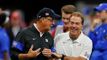 ATLANTA, GEORGIA - AUGUST 31: Head coach Nick Saban of the Alabama Crimson Tide and head coach David Cutcliffe of the Duke Blue Devils enjoy a laugh during pregame warmups at Mercedes-Benz Stadium on August 31, 2019 in Atlanta, Georgia. (Photo by Kevin C. Cox/Getty Images)