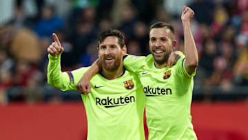 GIRONA, SPAIN - JANUARY 27: Lionel Messi of Barcelona celebrates after scoring his sides second goal with his teammate Jordi Alba during the La Liga match between Girona FC and FC Barcelona at Montilivi Stadium on January 27, 2019 in Girona, Spain. (Photo by Quality Sport Images/Getty Images)