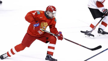 VANCOUVER , BC - JANUARY 5: Vasili Podkolzin #11 of Russia skates with the puck against Switzerland during a bronze medal game at the IIHF World Junior Championships at Rogers Arena on January 5, 2019 in Vancouver, British Columbia, Canada. (Photo by Kevin Light/Getty Images)