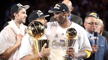 LOS ANGELES, CA - JUNE 17: Derek Fisher #2 and Kobe Bryant #24 of the Los Angeles Lakers celebrate after the Lakers defeated the Boston Celtics 83-79 in Game Seven of the 2010 NBA Finals at Staples Center on June 17, 2010 in Los Angeles, California. NOTE TO USER: User expressly acknowledges and agrees that, by downloading and/or using this Photograph, user is consenting to the terms and conditions of the Getty Images License Agreement. (Photo by Ronald Martinez/Getty Images)