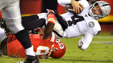 Kansas City Chiefs Tanoh Kpassagnon sacks Oakland Raiders quarterback Derek Carr during the second half against Oakland Sunday, Dec. 1, 2019 at Arrowhead Stadium in Kansas City. The Chiefs won, 40-9. (Rich Sugg/Kansas City Star/Tribune News Service via Getty Images)