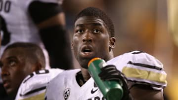 TEMPE, AZ - OCTOBER 12: Defensive lineman Chidera Uzo-Diribe #96 of the Colorado Buffaloes on the bench during the college football game against the Arizona State Sun Devils at Sun Devil Stadium on October 12, 2013 in Tempe, Arizona. The Sun Devils defeated the Buffaloes 54-13. (Photo by Christian Petersen/Getty Images)