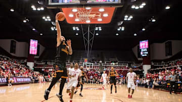 Feb 25, 2016; Stanford, CA, USA; USC Trojans guard Katin Reinhardt (5) dunks the ball against the Stanford Cardinal in the second half at Maples Pavilion. Mandatory Credit: John Hefti-USA TODAY Sports.