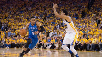 May 30, 2016; Oakland, CA, USA; Oklahoma City Thunder guard Russell Westbrook (0) dribbles the basketball against Golden State Warriors guard Shaun Livingston (34) during the third quarter in game seven of the Western conference finals of the NBA Playoffs at Oracle Arena. The Warriors defeated the Thunder 96-88. Mandatory Credit: Kyle Terada-USA TODAY Sports