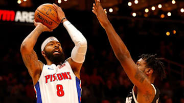 ATLANTA, GEORGIA - JANUARY 18: Markieff Morris #8 of the Detroit Pistons attacks the basket against Treveon Graham #2 of the Atlanta Hawks in the first half at State Farm Arena on January 18, 2020 in Atlanta, Georgia. NOTE TO USER: User expressly acknowledges and agrees that, by downloading and/or using this photograph, user is consenting to the terms and conditions of the Getty Images License Agreement. (Photo by Kevin C. Cox/Getty Images)