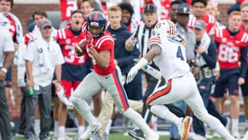 OXFORD, MS - OCTOBER 20: Wide receiver DaMarkus Lodge #5 of the Mississippi Rebels runs the ball by defensive back Noah Igbinoghene #4 of the Auburn Tigers during the second half at Vaught-Hemingway Stadium on October 20, 2018 in Oxford, Mississippi. (Photo by Michael Chang/Getty Images)
