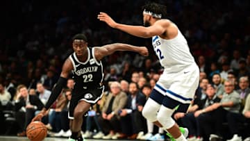 Karl-Anthony Towns of the Minnesota Timberwolves guards Caris LeVert of the Brooklyn Nets. (Photo by Emilee Chinn/Getty Images)