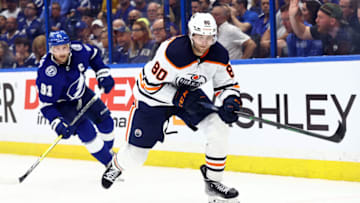 Markus Niemelainen, Edmonton Oilers #80 Feb 23, 2022; Tampa, Florida, USA; Edmonton Oilers defenseman Markus Niemelainen (80) skates with the puck as Tampa Bay Lightning center Steven Stamkos (91) defends during the third period at Amalie Arena. Mandatory Credit: Kim Klement-USA TODAY Sports