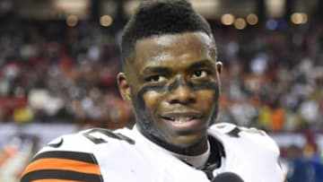 Nov 23, 2014; Atlanta, GA, USA; Cleveland Browns wide receiver Josh Gordon (12) is interviewed on the field after the game against the Atlanta Falcons at the Georgia Dome. The Browns defeated the Falcons 26-24. Mandatory Credit: Dale Zanine-USA TODAY Sports