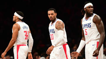 NEW YORK, NEW YORK - NOVEMBER 17: Montrezl Harrell #5 of the LA Clippers and teammates Mike Scott #30 and Tobias Harris #34 react to a call during the game against Brooklyn Nets at Barclays Center on November 17, 2018 in New York City. NOTE TO USER: User expressly acknowledges and agrees that, by downloading and or using this photograph, User is consenting to the terms and conditions of the Getty Images License Agreement. (Photo by Sarah Stier/Getty Images)