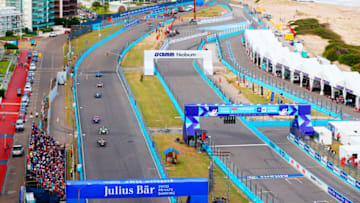 PUNTA DEL ESTE, URUGUAY - MARCH 17: In this handout provided by FIA Formula E, Jean-Eric Vergne (FRA), TECHEETAH, Renault ZE 17, leadsLucas Di Grassi (BRA), Audi Sport ABT Schaeffler, Audi e-tron FE04, and Sam Bird (GBR), DS Virgin Racing, DS Virgin DSV-03 during the Punta del Este ePrix, Round 6 of the 2017/18 FIA Formula E Series on March 17, 2018 at Playa Brava Beach in Punta del Este, Uruguay. (Photo by Sam Bloxham/FIA Formula E via Getty Images)