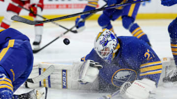 Apr 8, 2023; Buffalo, New York, USA; Buffalo Sabres goaltender Devon Levi (27) makes a save during the third period against the Carolina Hurricanes at KeyBank Center. Mandatory Credit: Timothy T. Ludwig-USA TODAY Sports