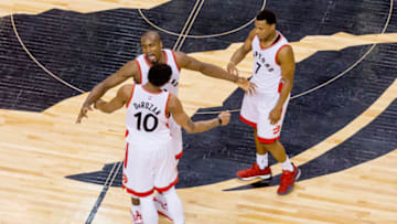 TORONTO, ON - APRIL 24 - DeMar DeRozan (10), Serge Ibaka and Kyle Lowry react after the Toronto Raptors defeated the Milwaukee Bucks 118-93 in game 5 of their NBA playoff series at the Air Canada Centre on April 24, 2017.Toronto now leads the best of seven series 3-2. (Carlos Osorio/Toronto Star via Getty Images)