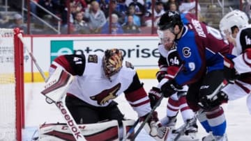 Nov 5, 2015; Glendale, AZ, USA; Arizona Coyotes goalie Mike Smith (41) makes a save on Colorado Avalanche center Matt Duchene (9) during the third period at Gila River Arena. Mandatory Credit: Matt Kartozian-USA TODAY Sports