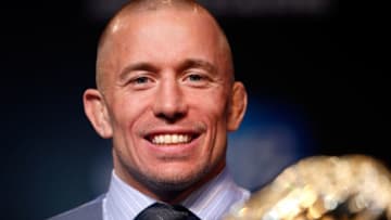 LAS VEGAS, NV - NOVEMBER 14: UFC welterweight champion Georges St-Pierre interacts with media during the final UFC 167 pre-fight press conference inside the Hollywood Theatre at the MGM Grand Hotel/Casino on November 14, 2013 in Las Vegas, Nevada. (Photo by Josh Hedges/Zuffa LLC/Zuffa LLC via Getty Images)