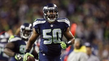Sep 15, 2013; Seattle, WA, USA; Seattle Seahawks outside linebacker K.J. Wright (50) celebrates after recovering a fumble against the San Francisco 49ers during the second quarter at CenturyLink Field. Mandatory Credit: Joe Nicholson-USA TODAY Sports