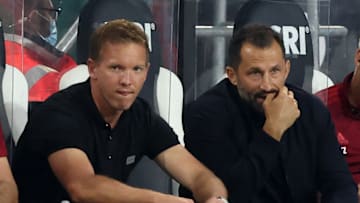 Bayern Munich sporting director Hasan Salihamidzic (R) is expecting strong response from team after international break. (Photo by Stefan Matzke - sampics/Corbis via Getty Images)