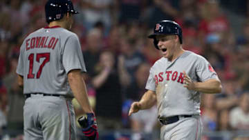 PHILADELPHIA, PA - AUGUST 15: Nathan Eovaldi #17 and Brock Holt #12 of the Boston Red Sox react after scoring runs in the top of the third inning against the Philadelphia Phillies at Citizens Bank Park on August 15, 2018 in Philadelphia, Pennsylvania. (Photo by Mitchell Leff/Getty Images)
