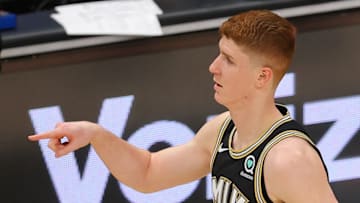 ATLANTA, GEORGIA - MAY 05: Kevin Huerter #3 of the Atlanta Hawks reacts after a three-point basket against the Phoenix Suns in the second half at State Farm Arena on May 05, 2021 in Atlanta, Georgia. NOTE TO USER: User expressly acknowledges and agrees that, by downloading and or using this photograph, User is consenting to the terms and conditions of the Getty Images License Agreement. (Photo by Kevin C. Cox/Getty Images)