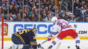BUFFALO, NY - FEBRUARY 15: Linus Ullmark #35 of the Buffalo Sabres makes a save against Connor Brickley #23 of the New York Rangers during an NHL game on February 15, 2019 at KeyBank Center in Buffalo, New York. (Photo by Rob Marczynski/NHLI via Getty Images)