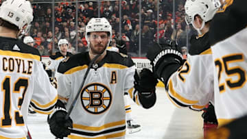 PHILADELPHIA, PA - JANUARY 13: David Krejci #46 of the Boston Bruins celebrates a second period goal with teammates on the bench against the Philadelphia Flyers on January 13, 2020 at the Wells Fargo Center in Philadelphia, Pennsylvania. (Photo by Len Redkoles/NHLI via Getty Images)