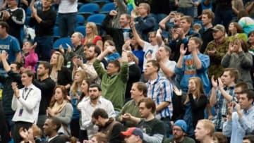 Jan 19, 2013; Minneapolis, MN, USA; Minnesota Timberwolves fans respond to a dunk by Minnesota Timberwolves power forward Chris Johnson (not pictured) against the Houston Rockets during the fourth quarter at Target Center. Timberwolves won 92-79. Mandatory Credit: Greg Smith-USA TODAY Sports