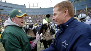 Jason Garrett of the Dallas Cowboys congratulates head coach Mike McCarthy (Photo by Mike McGinnis/Getty Images)