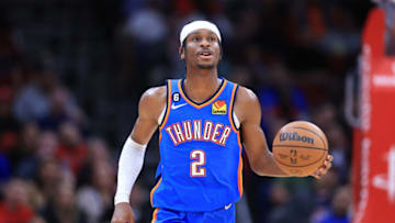 HOUSTON, TEXAS - FEBRUARY 01: Shai Gilgeous-Alexander #2 of the Oklahoma City Thunder controls the ball H during the second half at Toyota Center on February 01, 2023 in Houston, Texas. NOTE TO USER: User expressly acknowledges and agrees that, by downloading and or using this photograph, User is consenting to the terms and conditions of the Getty Images License Agreement. (Photo by Carmen Mandato/Getty Images)